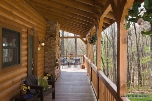 The floors on the porch and the deck are pressure-treated pine. “We had to let it season for a year before we put a stain on it,” Christine explains.