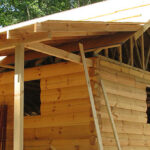 Thompson's Log Cabin by Honest Abe
