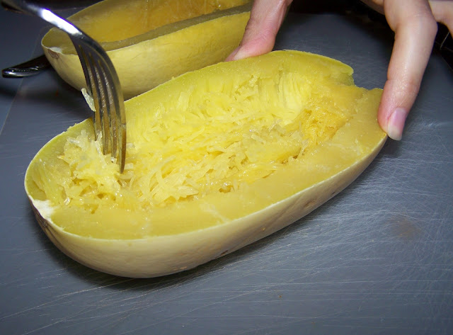 Using a fork to shred spaghetti squash